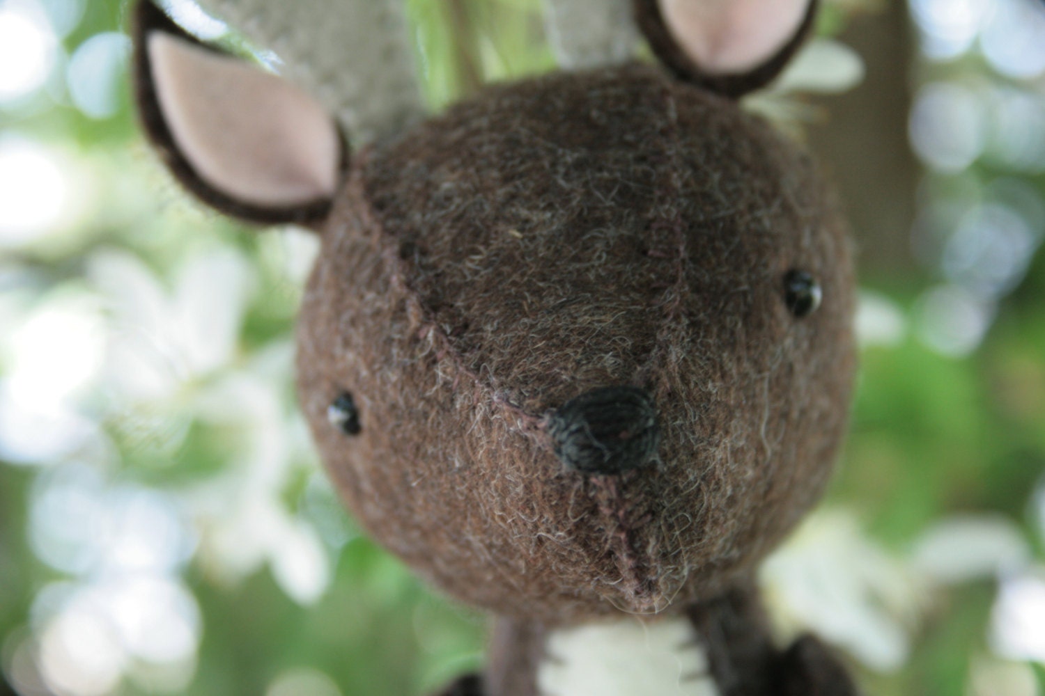 close up of felt deer face